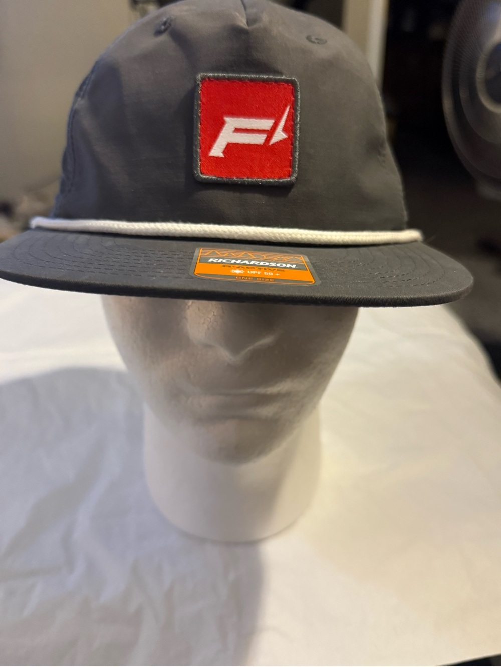 Gray Rope-Trim Cap with Red Patch